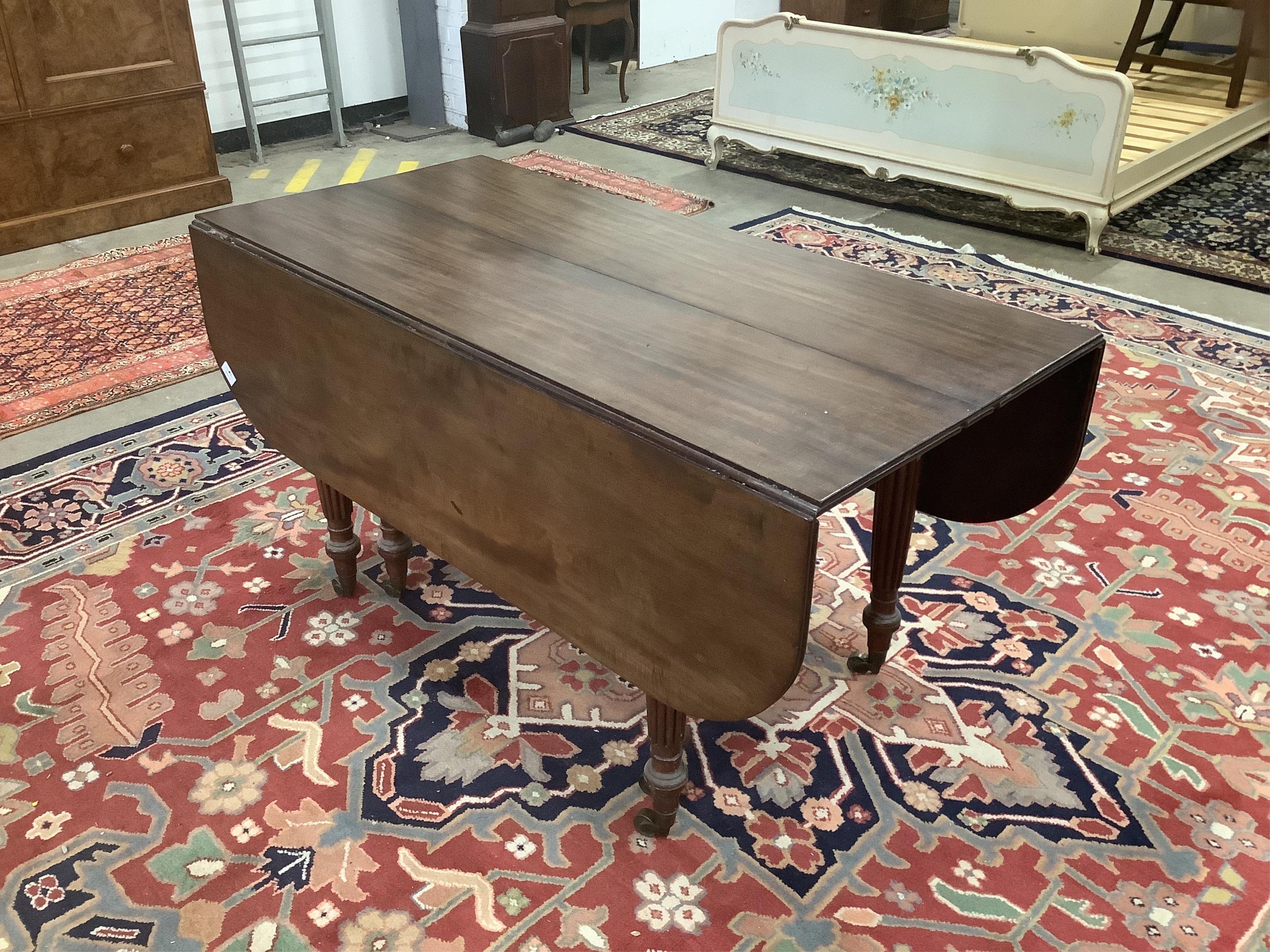 A Regency Gillows style mahogany extending dining table, 276cm extended, three spare leaves, depth 137cm, height 71cm. Condition - fair